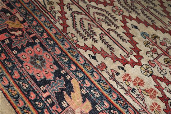 A Persian carpet, 343cm x 236cm